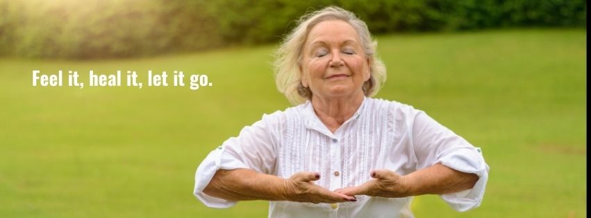 A person practicing mindfulness and relaxation, representing the stages of emotional healing and personal growth.